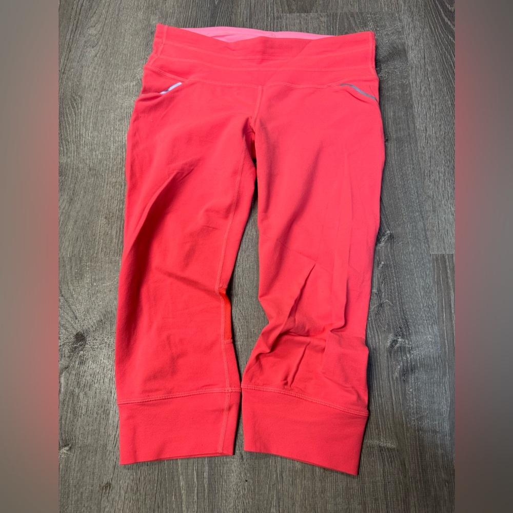 Athleta Relay Capri running leggings Women’s Workout Pants Reflective Mesh M